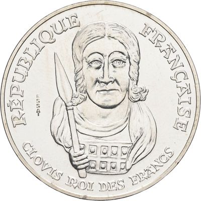 l'image d'une pièce de monnaie sur laquelle figure une femme tenant un couteau