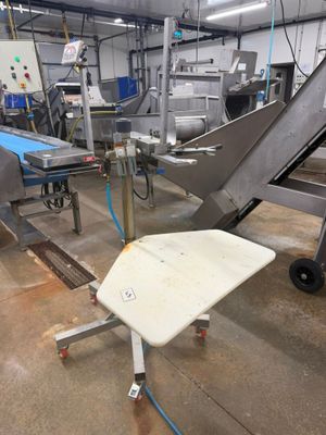 a chair that is sitting in the middle of a factory