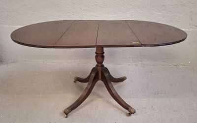 Table à volets en acajou et placage d'acajou, le fût central… - Photo 1