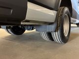 a close up of a truck with a flat tire