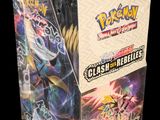 a close up of a box of pokemon cards on a black background