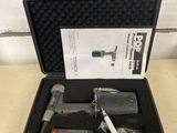 an image of a tool kit in a case on a table