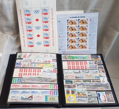 a lot of stamps on a table with a book