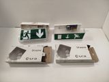 three boxes with different signs on them on a table