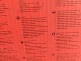 a red sheet of paper that has a list of things on it