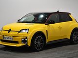 the yellow car is parked in a room with a checkered floor