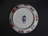 a plate with a picture of a man on it