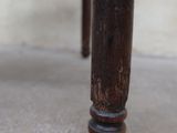 a close up view of the legs of a wooden table