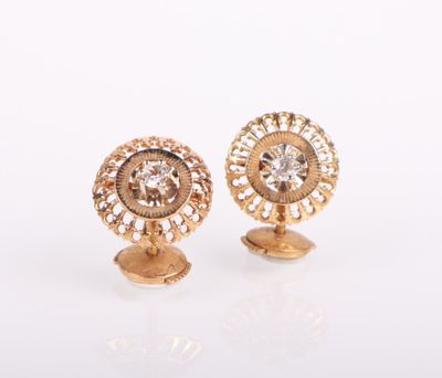 pair of gold and diamond stud earrings on a white background