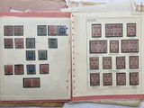 a lot of stamps on the pages of a book