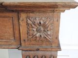 a close up view of a wooden table with a clock on it