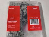 a plastic package with a bunch of chains in it