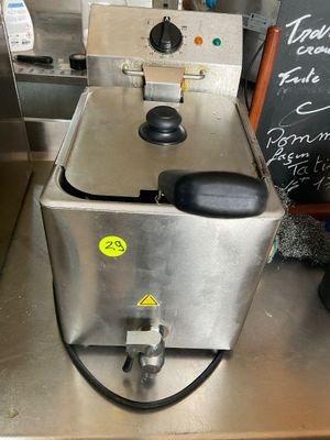 a machine that is sitting on a counter in a kitchen