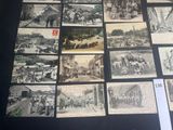 a lot of old black and white photos on the wall
