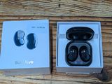 a box with a pair of earphones inside of it