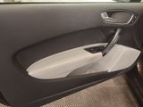 a picture of a car door with the door handle open