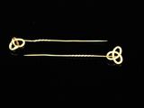 a pair of gold plated hair pins with a knot design