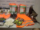 a table with a lot of items that include gloves, gloves, gloves, gloves, gloves, and other items