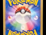 a close up of a pokemon card on a black background
