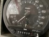 a close up of a speedometer in a box