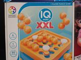 two boxes of toys that are sitting on a table