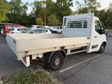 a white truck that is parked in a parking lot