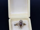 a ring in a box that is sitting on a table