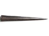 a close up of a knife on a white surface with a white background
