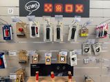 a display of various electronic devices on display in a store