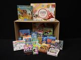 de nombreux livres pour enfants dans une boîte posée sur une table