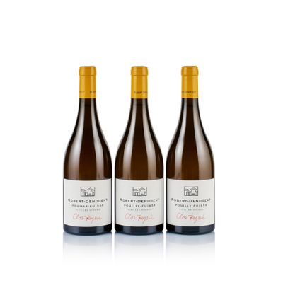 three bottles of wine sitting on top of a white surface