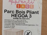 a cardboard box with a picture of a baby crib in it