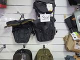 many bags hanging on the wall of a store