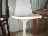 a chair that is sitting on top of a table