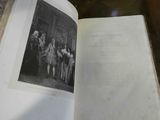 an open book with a picture of a group of people