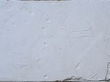 a white piece of paper with a number 7 on it