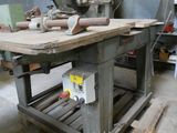a machine that is sitting on a pallet in a garage