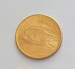 two coins that are next to each other on a table
