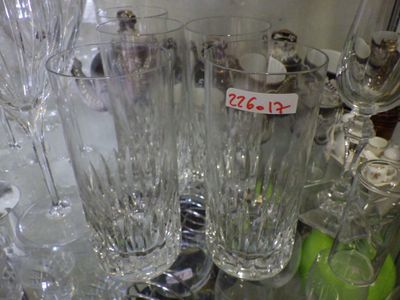 a lot of wine glasses on the table