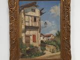 a picture of a painting of a house on a shelf