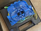 a box with wires and wires in it on the floor