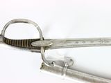 an old pair of scissors on a white surface