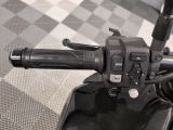 a close up of a motorcycle handlebar on a motorcycle