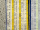 two michel michel timetables are on a table next to each other