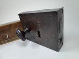 an old lock with a key on a white background