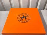 an orange box with the logo of a horse on it