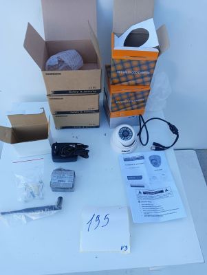 two boxes of electronic equipment sitting on a table