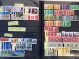 many different stamps on the pages of a book