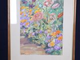 a picture of a painting on a easel with a blue background