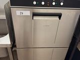 an image of a dishwasher in a commercial kitchen